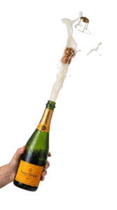 Champagne bottle popping white b… 202607101501