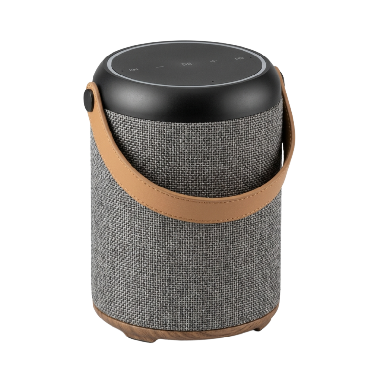 A bluetooth speaker with a leather strap on it.