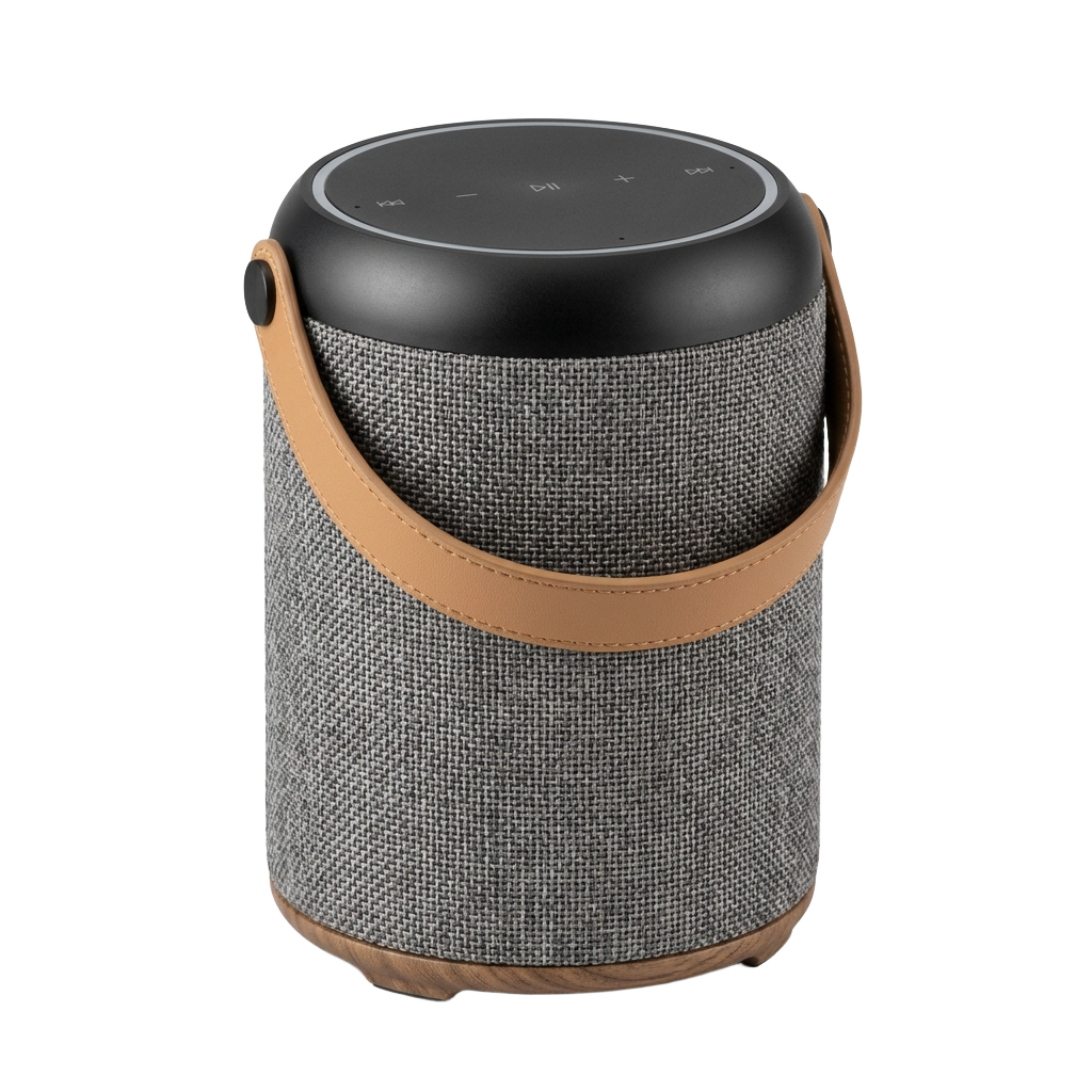 A bluetooth speaker with a leather strap on it.