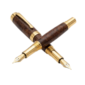 A pair of fountain pens sitting next to each other.