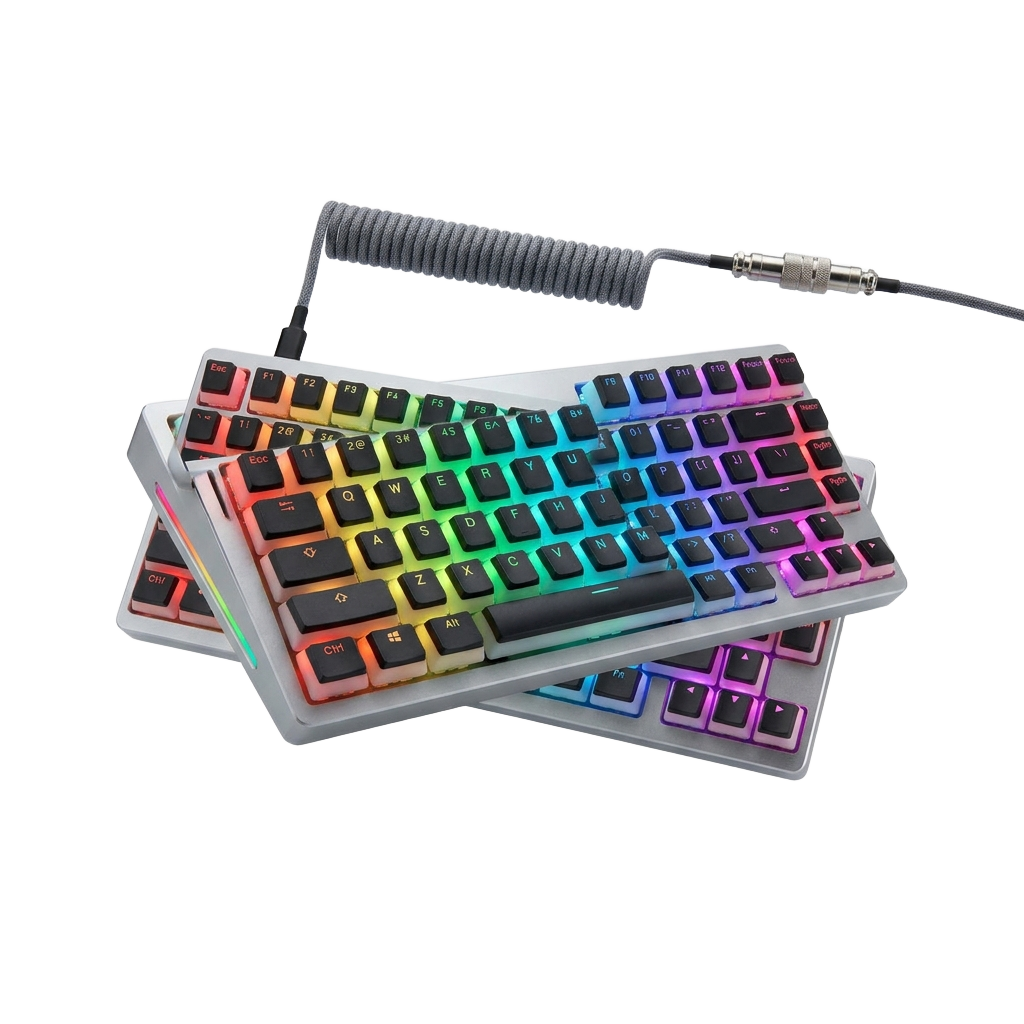 A pair of keyboards sitting next to each other on a white surface.
