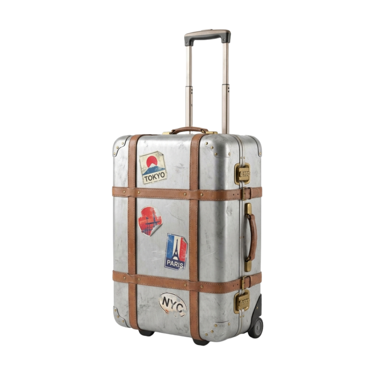 A silver suitcase with stickers on it.