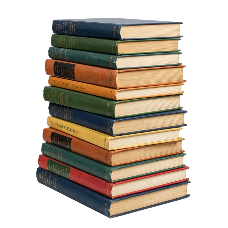 A stack of books sitting on top of each other.