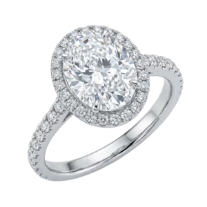 A white gold engagement ring with a halo of diamonds.
