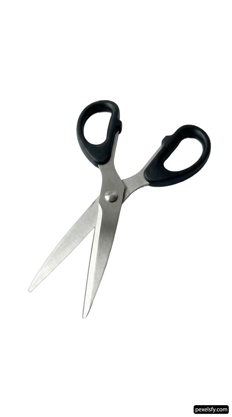 Pair of scissors sitting on top of a white surface png transparent background