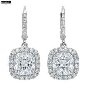 Pair of white gold earrings with a cushion cut diamond png transparent background