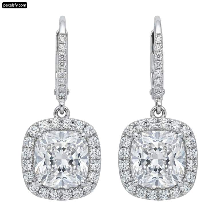 Pair of white gold earrings with a cushion cut diamond png transparent background