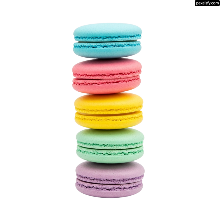 Stack of colorful macarons sitting on top of each other png transparent background
