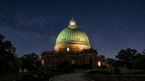 Green dome illuminated at night