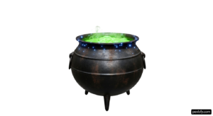 Cauldron filled with green liquid sitting on top of a table png transparent background