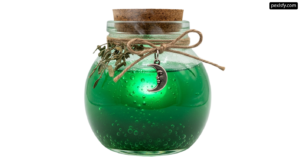 Glass jar filled with green liquid and a crescent moon png transparent background