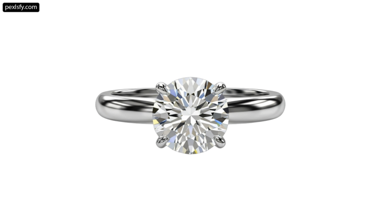 White gold engagement ring with a round brilliant cut diamond png transparent background