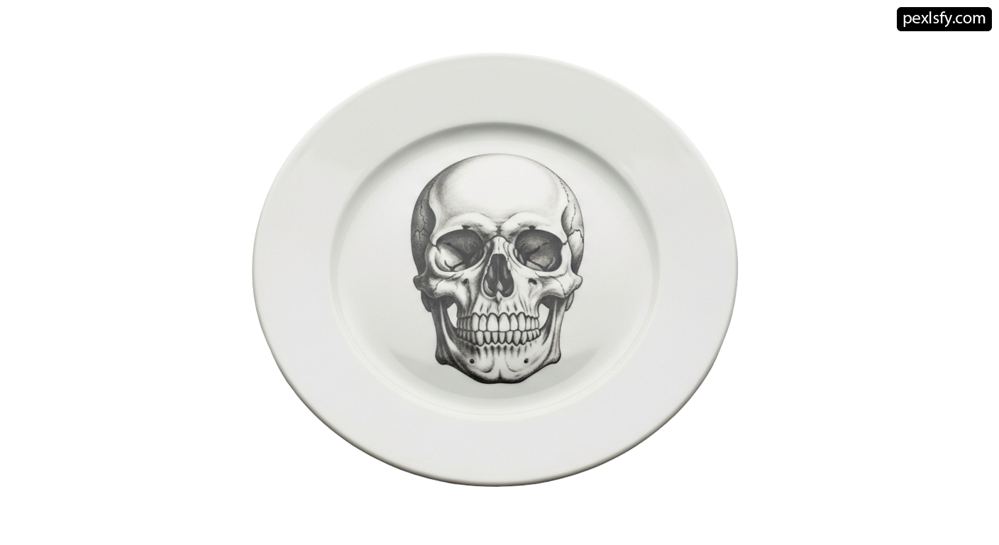 White plate with a black and white skull on it png transparent background